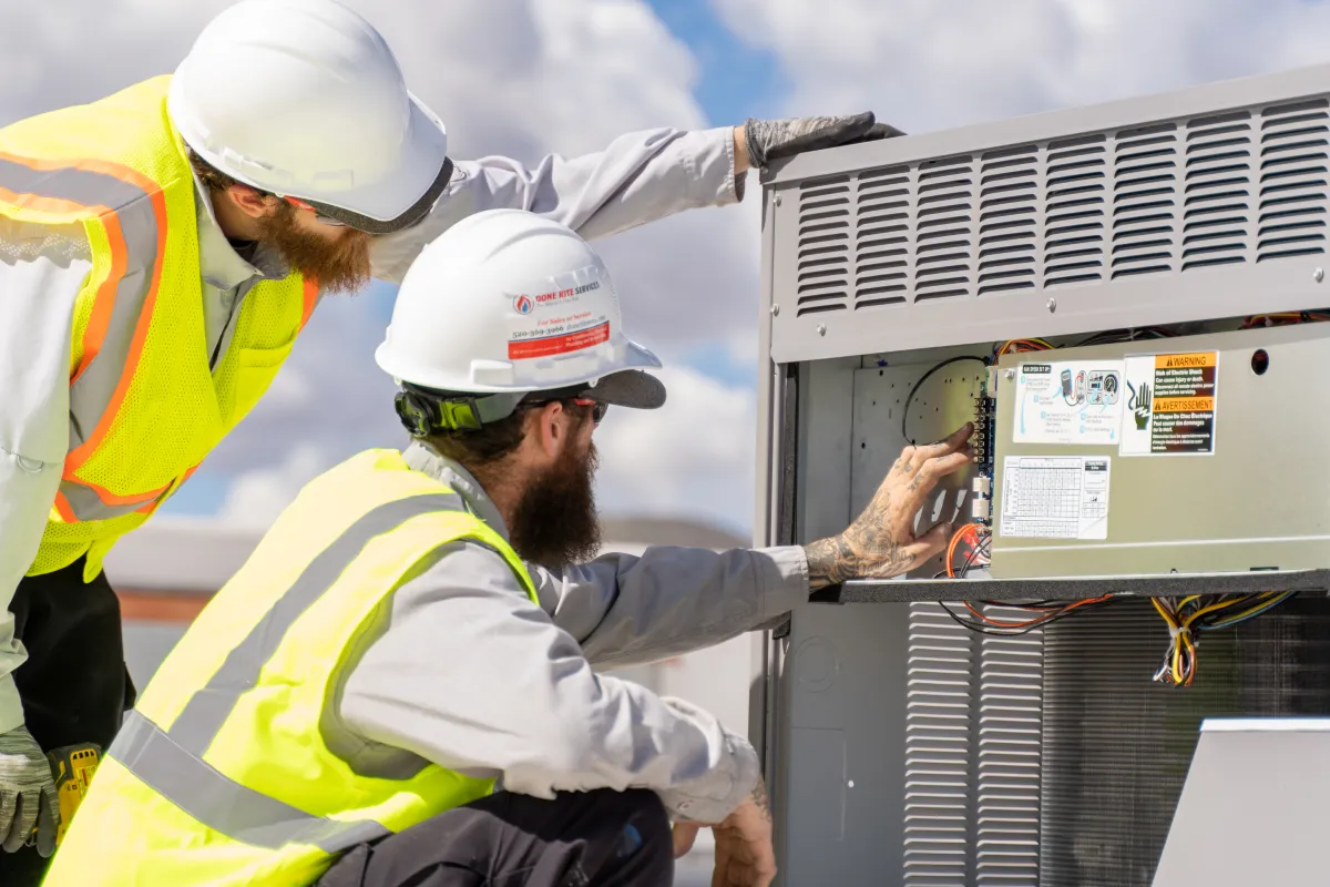 Done Rite Services technicians responding to an after-hours air conditioning call