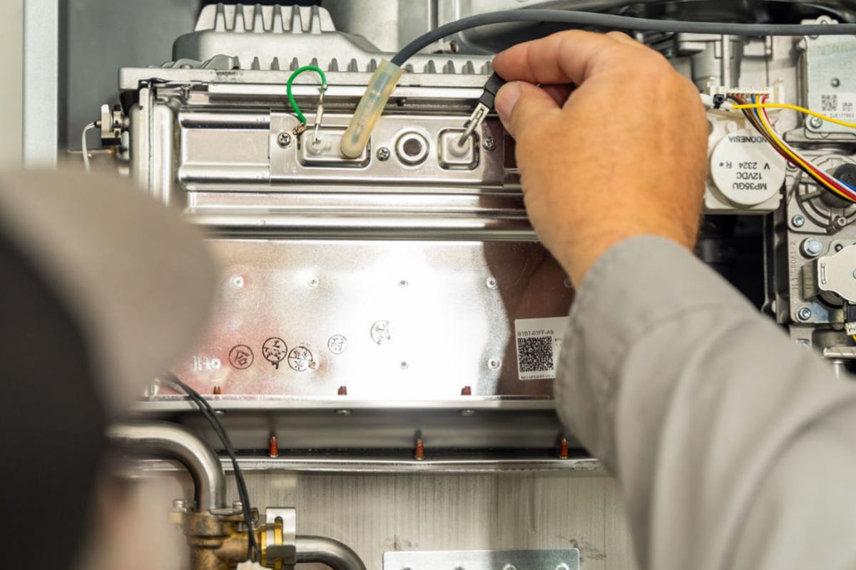 Gas connections inside an opened tankless water heater