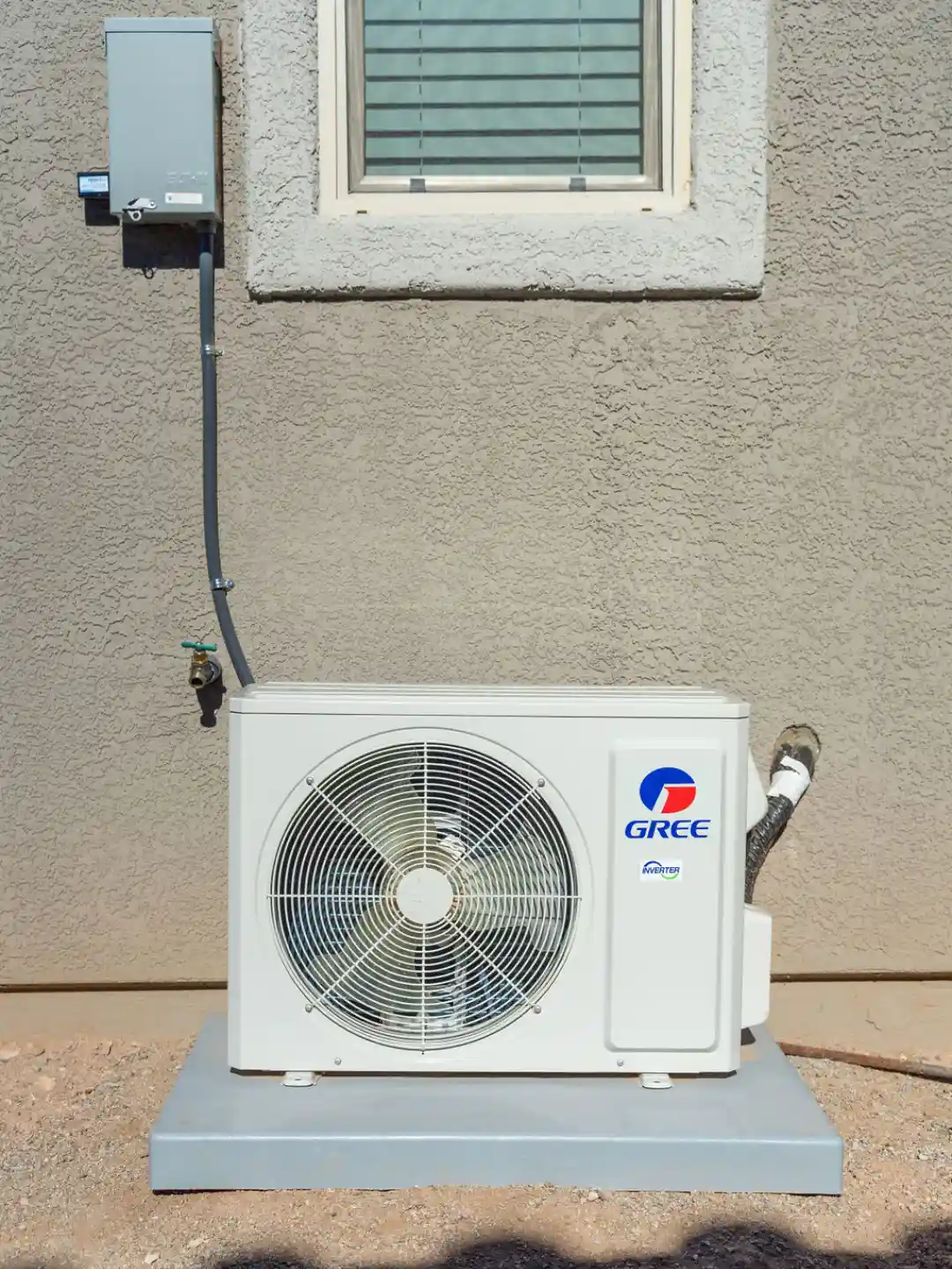 Ductless mini split outdoor condenser installed at a Tucson property