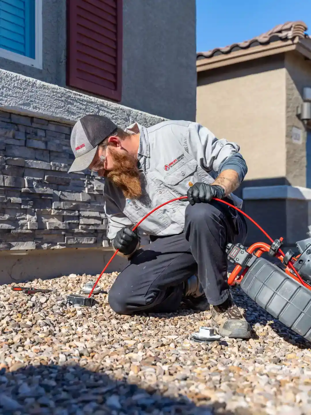 Testing a cleared drain line at a Tucson home