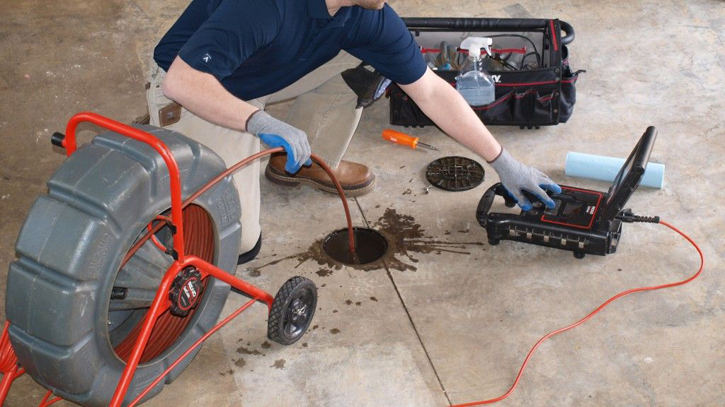 Main sewer line being cleared at a cleanout in Tucson