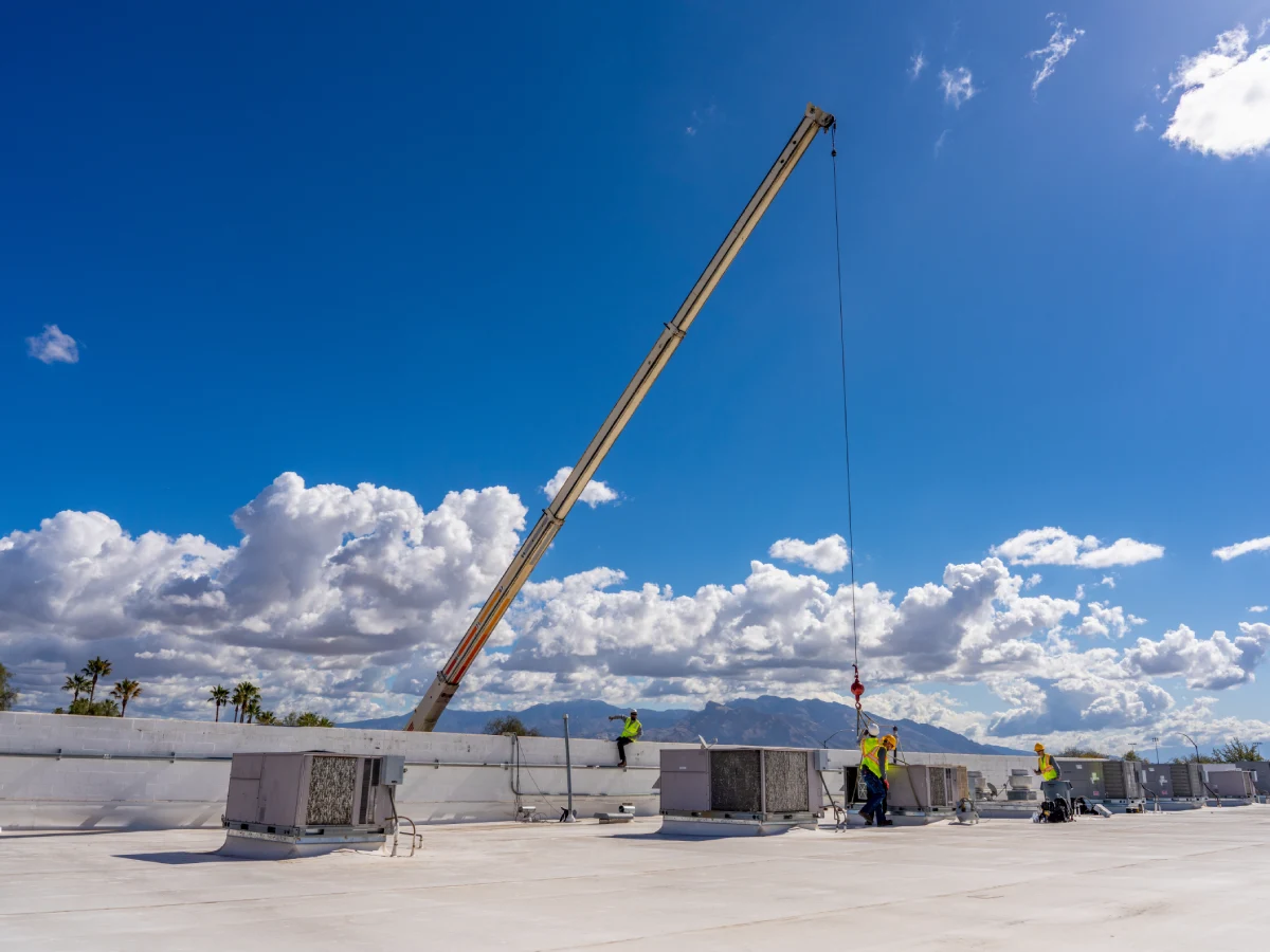 Air conditioning system installed by crane in Tucson